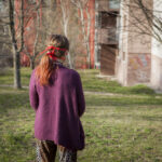 girl wearing face mask outside during pandemic 2020